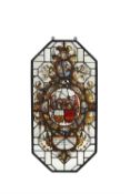 A Netherlandish stained and leaded glass armorial panel, 17th century