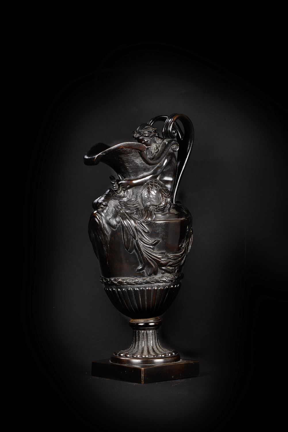 A French patinated bronze ewer, to the model by Sigisbert-Francois Michel...