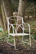 A Regency white painted wrought iron garden armchair