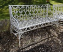 A French white painted cast iron Gothic Revival garden bench