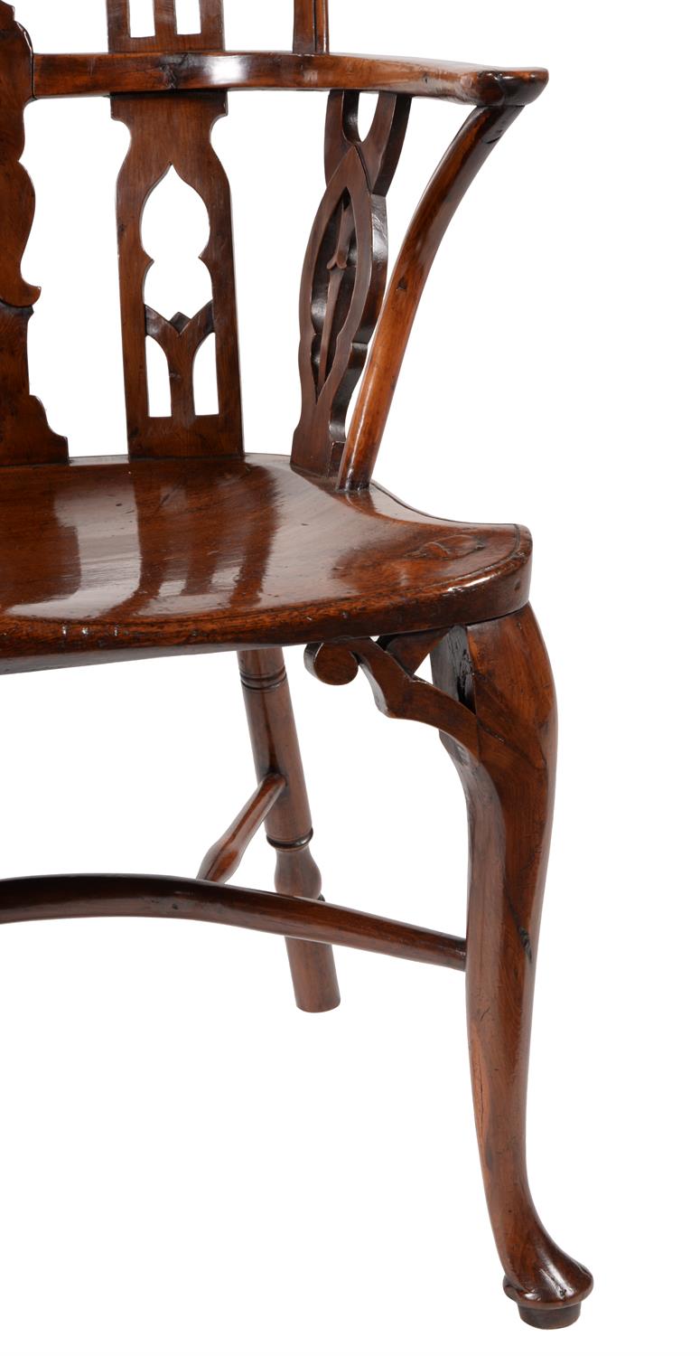 A pair of yew and mahogany Gothic Windsor armchairs - Image 4 of 5