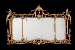 A carved giltwood wall mirror, in George III style