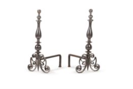 A pair of large and impressive silvered andirons, in 17th century style