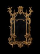 A carved giltwood and gesso wall mirror, in George II style, first half 19th century