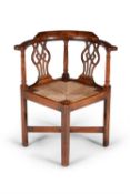 A George III walnut corner chair, circa 1760