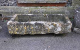 A large carved limestone trough