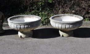 A pair of composition tazza urns