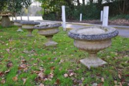 Four stone composition tazza urns
