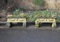A pair of stone planters in 18th century Italian style