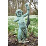 A verdigris patinated bronze model of a torch-bearing putto