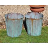 A pair of verdigris copper buckets or planters