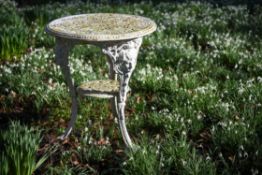 A white painted cast iron garden table