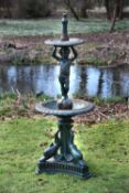 A Victorian green painted cast iron two tier fountain