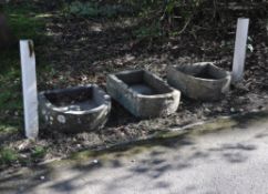 Three various stone troughs or basins