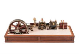 An exhibition model of an inline tandem condensing Corliss valve compound factory mill engine
