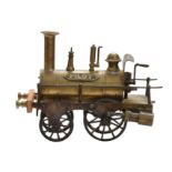 A period model of polished brass 'Piddler' 2-2-0 steam locomotive