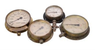 A collection of four ships engine room gauges.