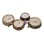 A collection of four ships engine room gauges.