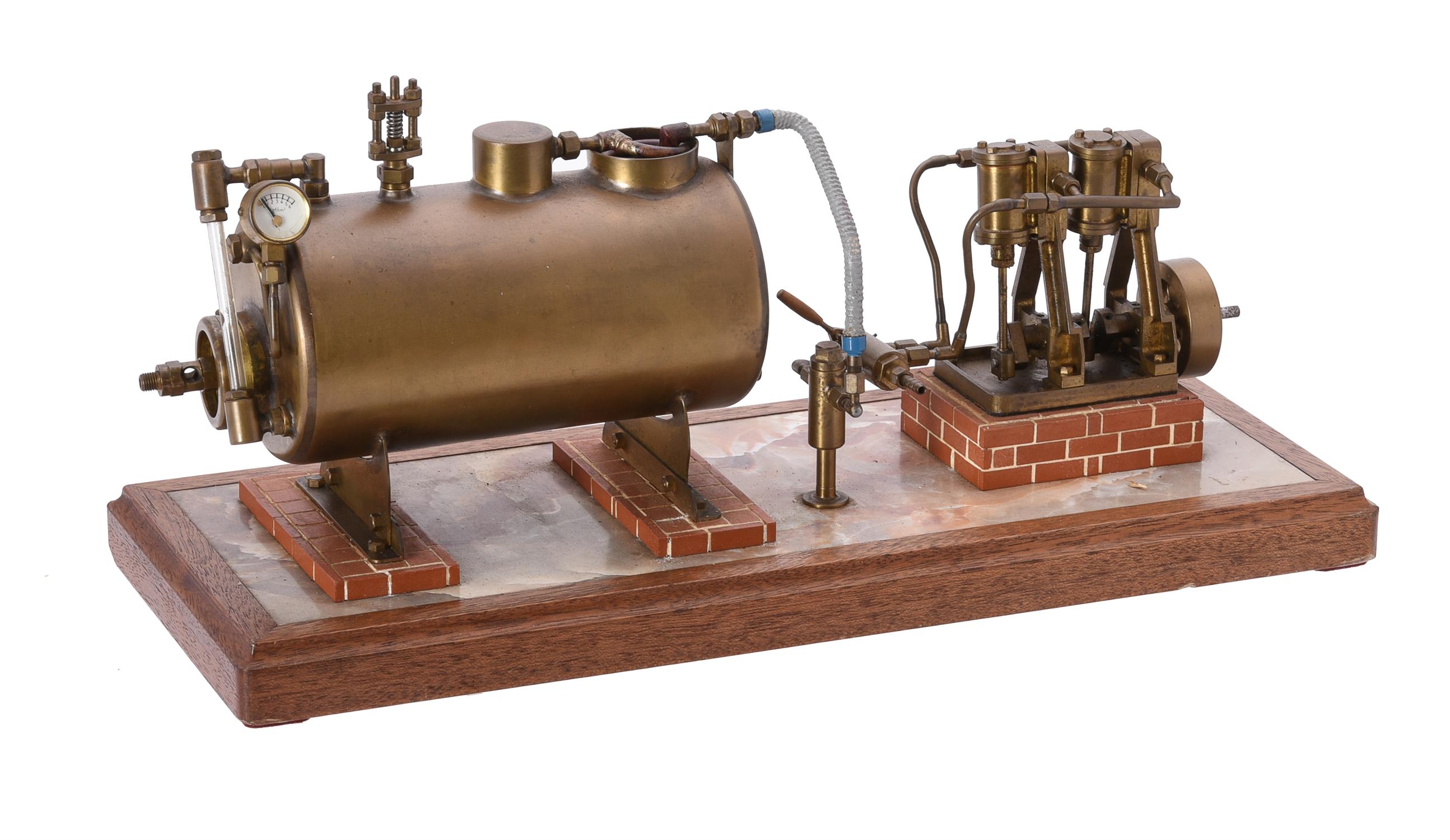 A well engineered model of a twin oscillating vertical steam engine