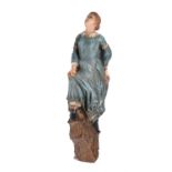 A large ships composition figure head of lady in sky blue Victorian-style dress