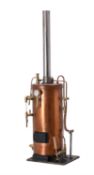 A vertical copper live steam boiler