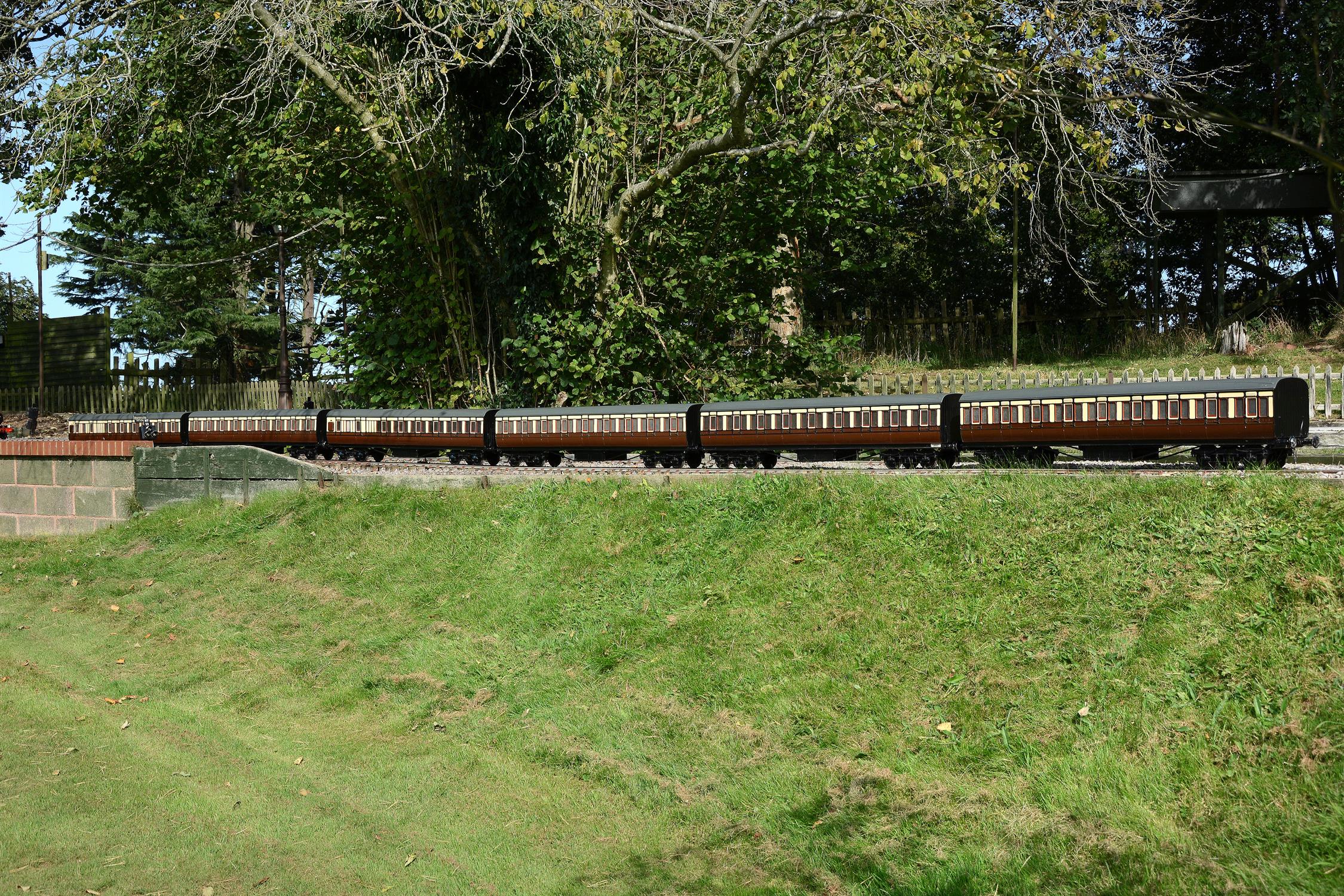 A rake of six 5 inch gauge Great Western Railway bogie coaches