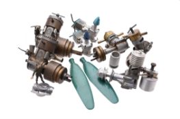 A collection of seven model aeroplane engines.