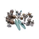 A collection of seven model aeroplane engines.