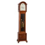 A mahogany eight-day quarter-chiming longcase clock