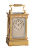 A fine French gilt brass carriage clock with painted porcelain panels and push-button repeat