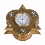 A Victorian gilt table clock in the manner of Thomas Cole