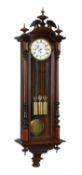 A Viennese walnut grande-sonnerie striking regulator wall clock