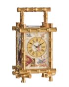 A fine French gilt bamboo cased miniature carriage timepiece with Aesthetic style porcelain panels