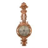 A Victorian carved oak mercury wheel barometer