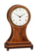 A George III kingwood crossbanded mahogany balloon-shaped table timepiece with fired enamel dial