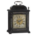 A rare William III ebonised table timepiece with alarm, John Bushman
