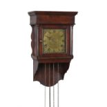 A George III stained pine hooded wall alarm timepiece