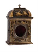 An unusual black japanned watch stand in the form of a miniature table clock