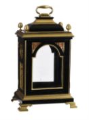 A fine George III brass mounted small ebonised table clock case