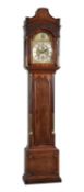 A George III mahogany eight-day quarter chiming longcase clock