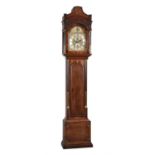 A George III mahogany eight-day quarter chiming longcase clock