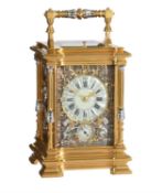 A fine French gilt carriage clock with multi-colour relief cast panels and push-button repeat