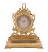 A fine Victorian engraved gilt brass mantel clock in the style of Thomas Cole