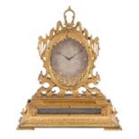 A fine Victorian engraved gilt brass mantel clock in the style of Thomas Cole