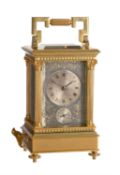 A rare gilt brass carriage clock with push-button repeat, alarm and musical movement to base