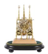 A Victorian lacquered brass 'Litchfield Cathedral' hour striking skeleton clock