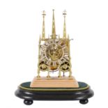 A Victorian lacquered brass 'Litchfield Cathedral' hour striking skeleton clock