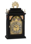 An Austrian ebonised quarter-striking table clock