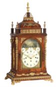 An impressive George III brass mounted musical quarter-chiming automaton table clock
