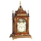 An impressive George III brass mounted musical quarter-chiming automaton table clock